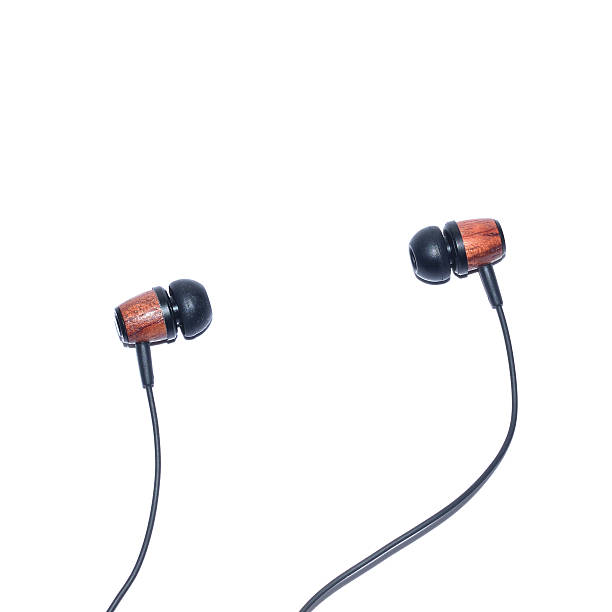 istock Wooden earphone isolated on white 186000054