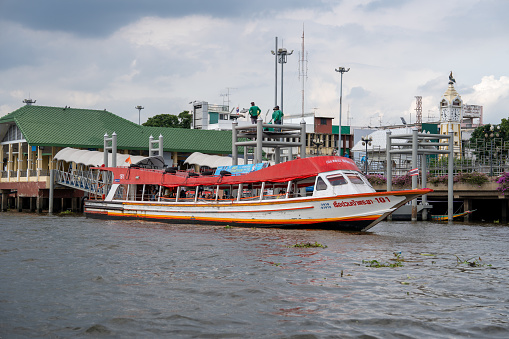 Express boats travel along the Chao Phraya River in Bangkok every day.
These boats are very popular as a means of transportation and practical in everyday life.
Several different routes are offered.
The picture shows such a boat, which travels the route from Sathorn to Nonthaburi  
Bangkok Thailand
December 15, 2023