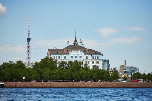 SAINT PETERSBURG, Russia - JUNE 2, 2021: Old buildings on the banks of the Neva River