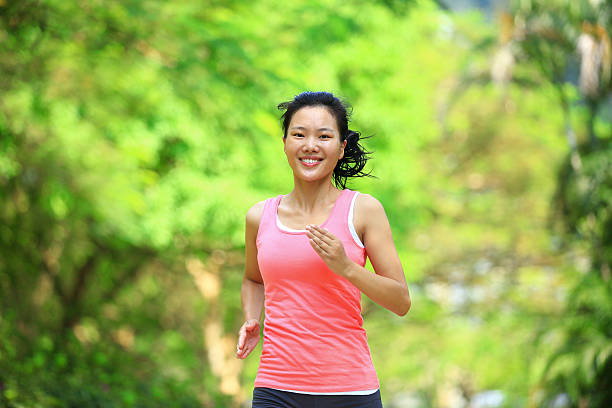 istock healthy woman running 186003458