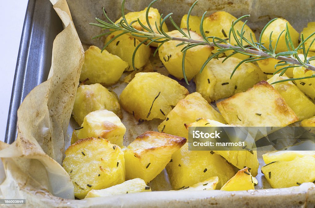 Roasted potatoes Baking roast potatoes with rosemary Prepared Potato Stock Photo