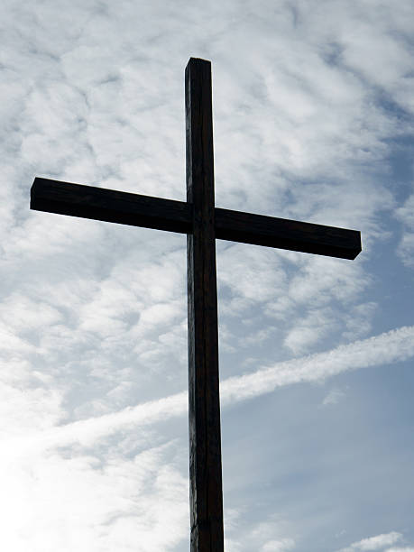 istock Catholic cross against the sky 186003982
