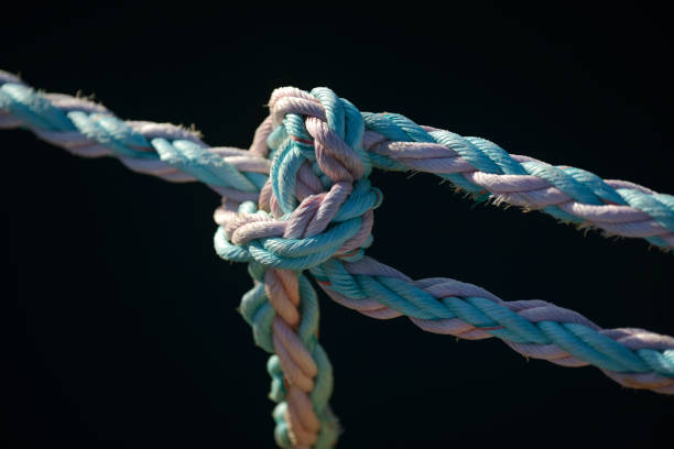 istock Saint-Malo, knotting a rope knot 1860051700