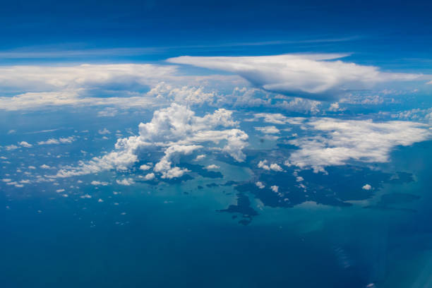 Deep Blue Ocean with Cloud and an Island seen from Sky