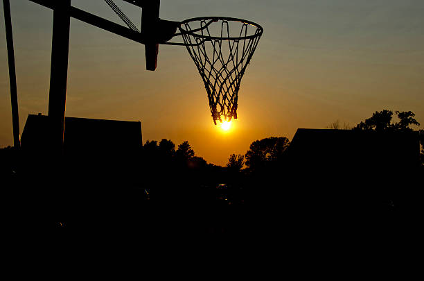 istock silhouette of a basketball net 186005724