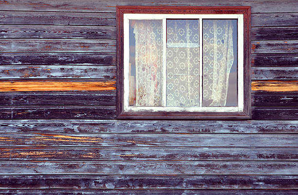 istock old wooden house with window 186006158