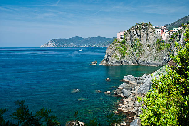 Village of Campiglia Tramonti on a large cliff in Cinque Terre National Park at the Ligurian Sea, Italy.
