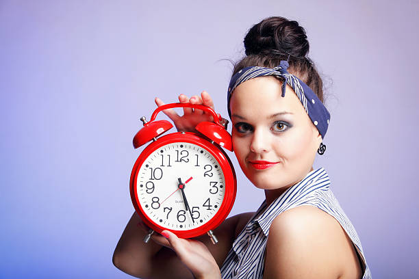 istock Woman with red clock. Time management concept. 186008835