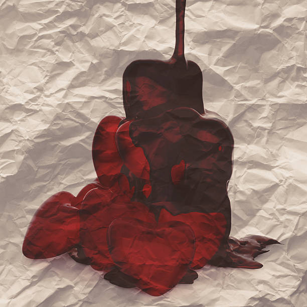 istock chocolate syrup leaking over heart shape symbol 186010900