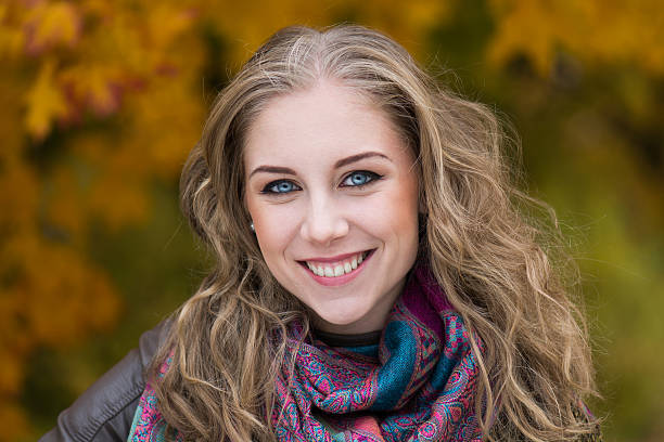 istock Young woman in beautiful autumn park 186010926