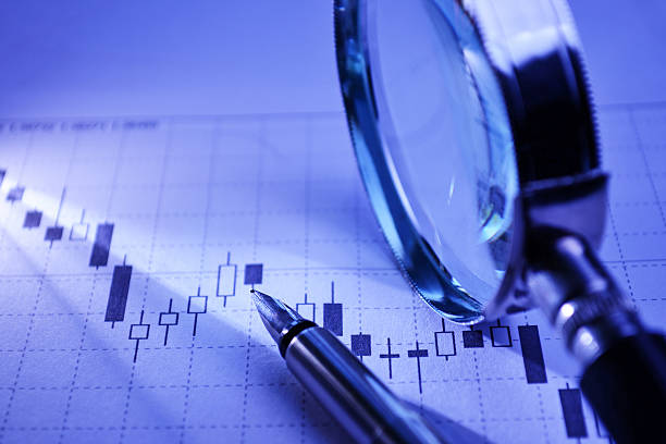 istock Business graph with pen and magnifying glass 186011061
