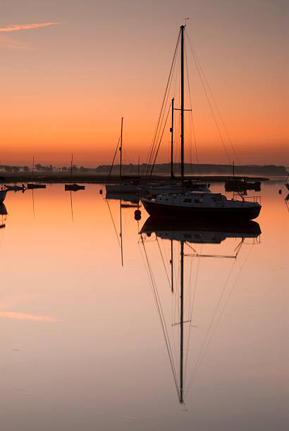 istock Sailing yachts in the dawn, River Deben, Walderingfield, Suffolk 186011234