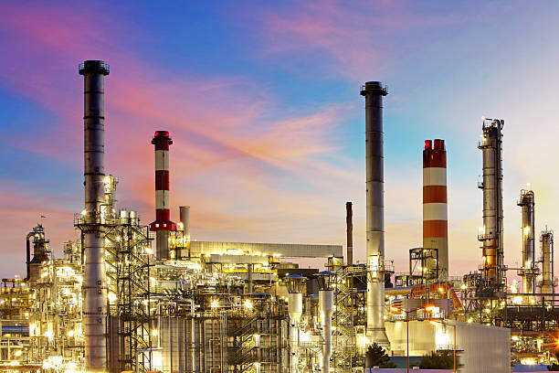 istock Factory at sunset - oil refinery 186011307