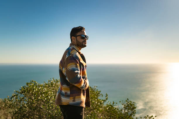 istock Man in cold weather clothes in nature 1860113306