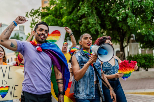 istock LGBTQIA+ people marching during social movement protesting outdoors 1860136242