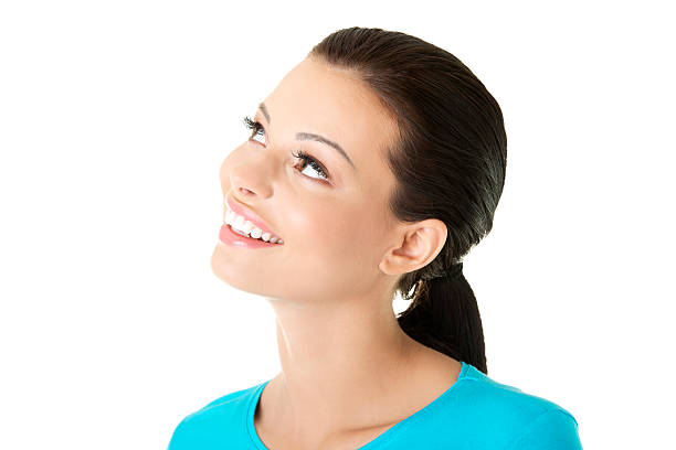 istock Attractive woman looking up. Closeup. 186013673
