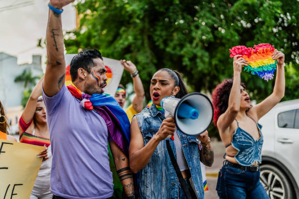 istock LGBTQIA+ people marching during social movement protesting outdoors 1860136753