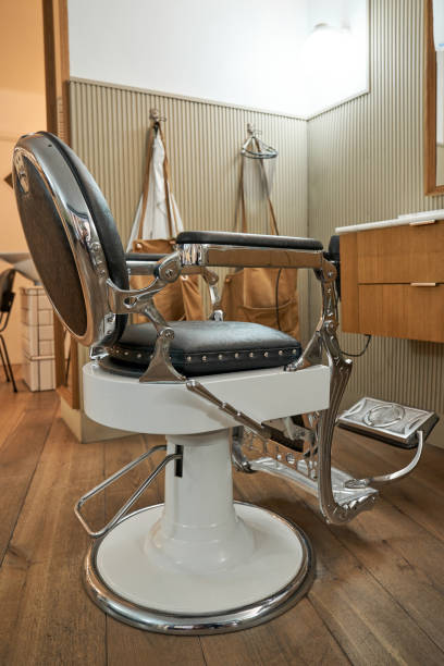 istock Empty leather chair in barbershop 1860139975