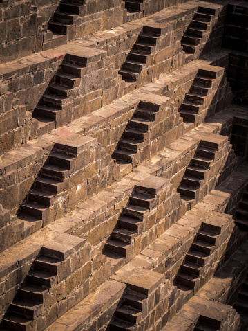 Multiple stairs at the downright Escherian Chand Baori stepwell in the village of Abhaneri in Rajasthan, India.