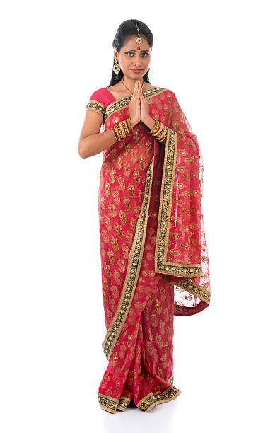 istock Indian girl in a greeting pose 186016730
