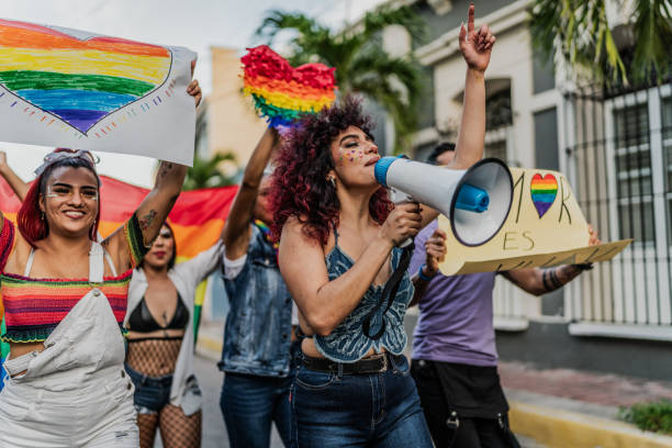 istock LGBTQIA+ people marching during social movement protesting outdoors 1860170807