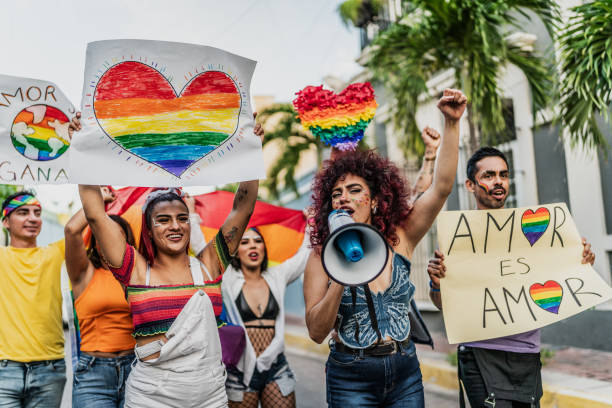 istock LGBTQIA+ people marching during social movement protesting outdoors 1860170811