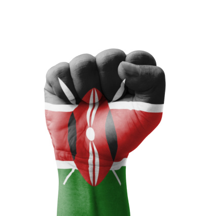 Fist of Kenya flag painted, multi purpose concept - isolated on white background