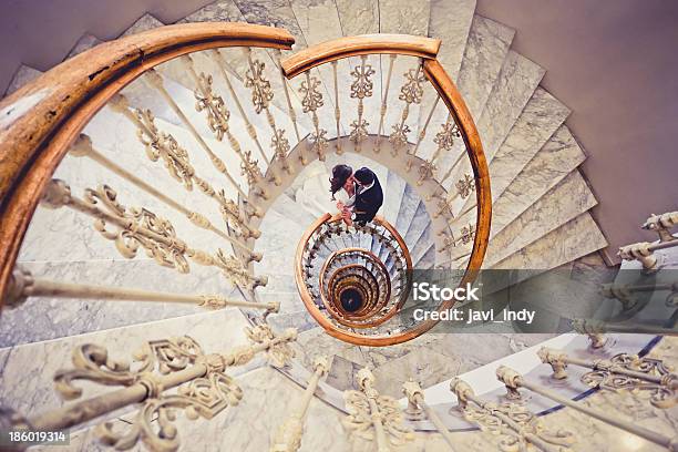 Just Married Couple Together In A Spiral Staircase Stock Photo - Download Image Now - Spiral, Staircase, Couple - Relationship