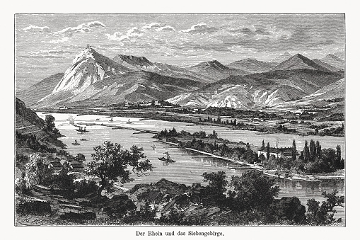 Historical view of the Sieben Mountains or Seven Mountains (German: Siebengebirge) - a hill range of the German Central Uplands on the east bank of the Middle Rhine, southeast of Bonn, North Rhine-Westphalia. It is a popular tourist destination for hiking, because of its natural environment. Wood engraving after a drawing by Hermann Ludwig Heubner (German painter, 1843 - 1915), published in 1894.