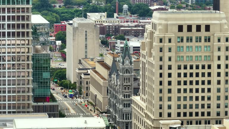 Broad street in historical downtown district in Richmond Virginia. Historical old City Hall building. Architecture in USA.