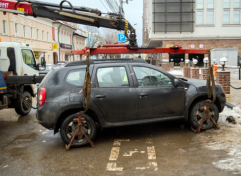 Tula, Russia - January 3, 2021: Loading a car using a tow truck with a manipulator
