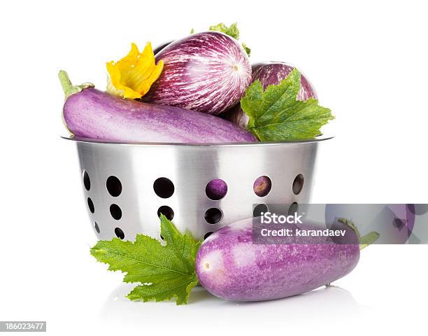 Fresh Ripe Eggplants In Colander Stock Photo - Download Image Now - Bowl, Bright, Clean