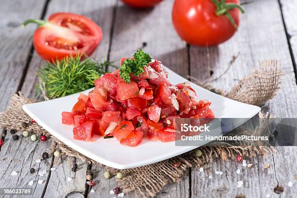 Portion Of Tomatoe Salad Stock Photo - Download Image Now - Appetizer, Bunch, Chopped Food