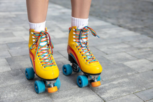 istock Woman trying on her new rollerblades 1860238551