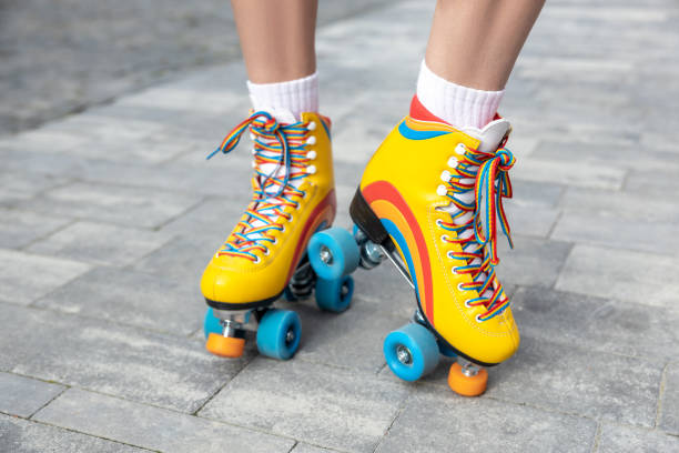 istock Woman trying on her new rollerblades 1860238555