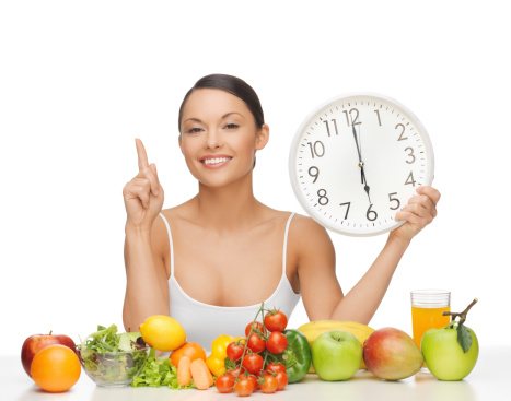 after six o'clock diet - happy woman with fruits and vegetables