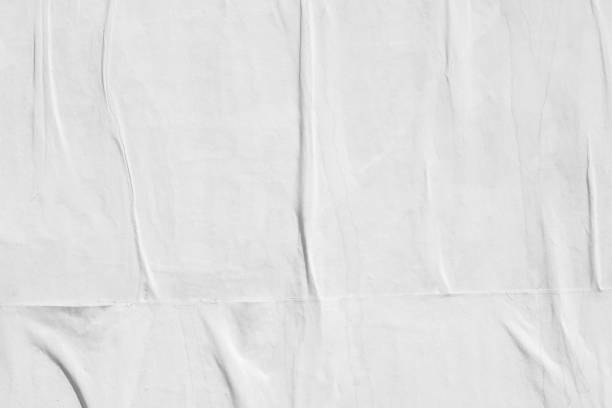istock Blank white black old ripped torn paper crumpled creased posters grunge textures backdrop backgrounds placard 1860272676