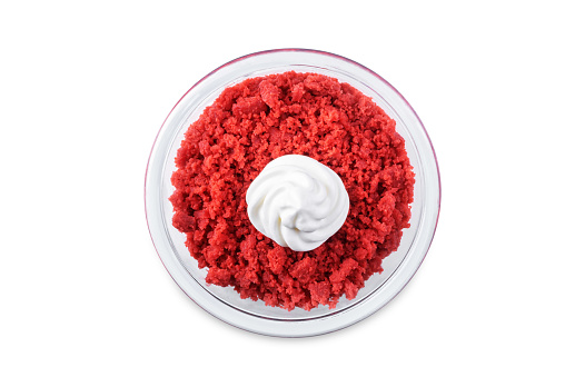 Red velvet greek yogurt parfait in a glass for Valentine's day holiday on a white isolated background. toning