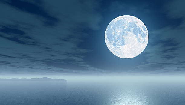 Moon over the sea stock photo