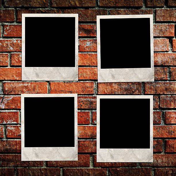 istock photo frames on wooden background 186031912