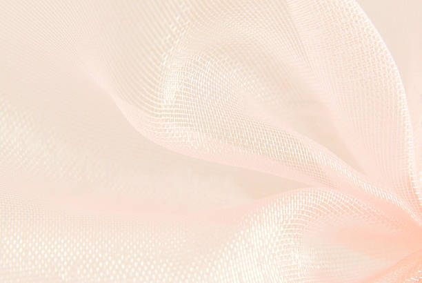 istock pink organza macro blurry texture background 186034976