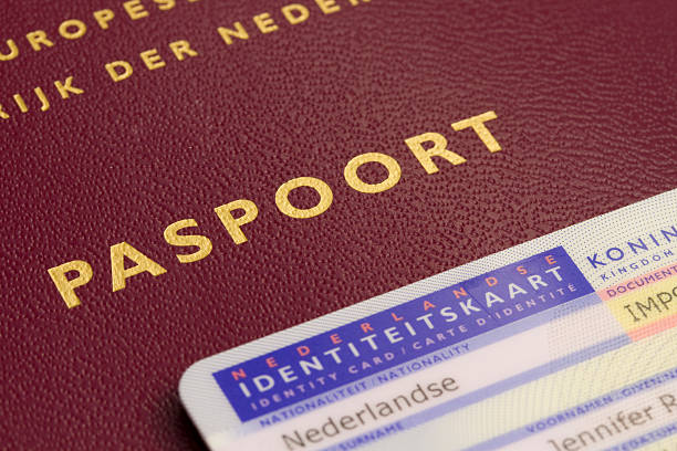 Dutch passport and ID card part of a Dutch passport and Dutch ID card geographical border photos stock pictures, royalty-free photos & images