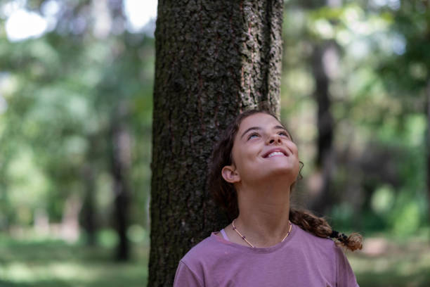 istock girl enjoys in the forest 1860371615