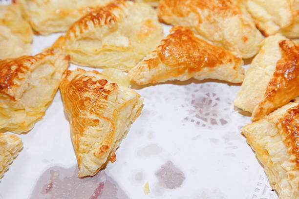istock Puff cookies apple turnovers food background 186040358