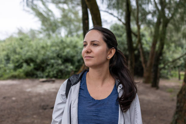 istock Latin woman in the forest 1860409776