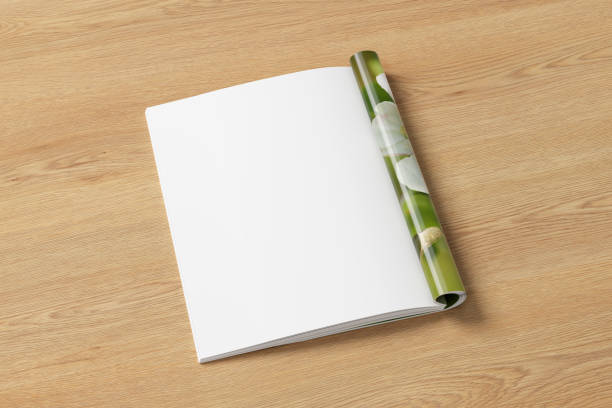 istock Magazine left-hand page mockup on wooden background 1860419208