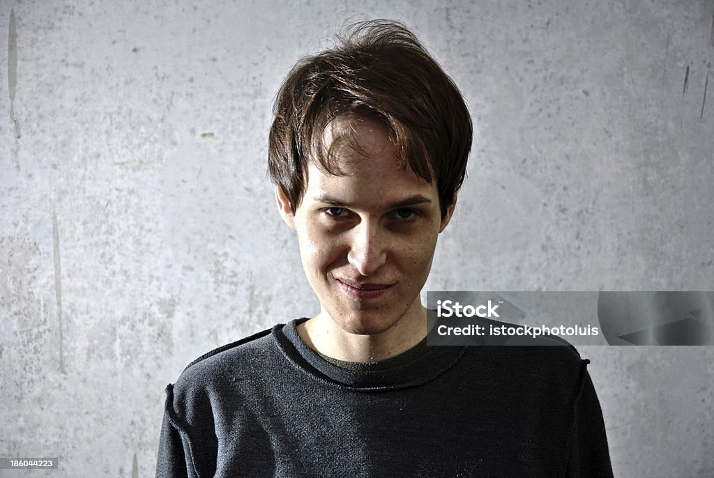 Crazy young man Crazy young man with the face of evil Psychopathy Stock Photo