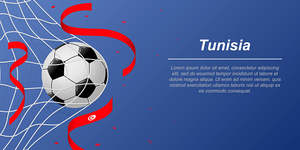 Soccer background with flying ribbons in colors of the flag of Tunisia. Realistic soccer ball in goal net.