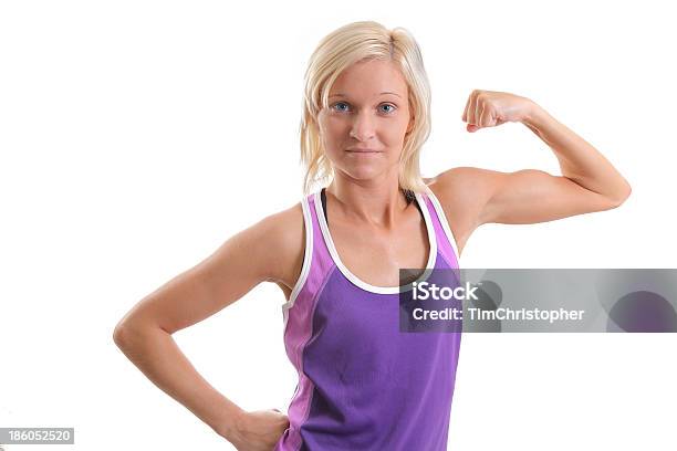 Beautiful Blue Eyed Flexing Blond Stock Photo - Download Image Now - Active Lifestyle, Adult, Aerobics