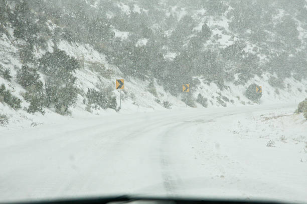 country road in snow stock photo